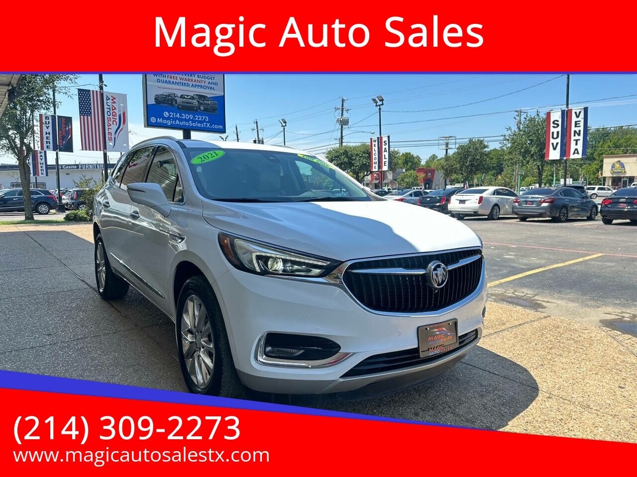 White Buick Envision before enhancement on a busy dealership lot